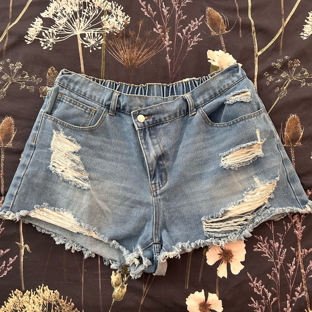Distressed Jean Shorts With Asymmetrical Button